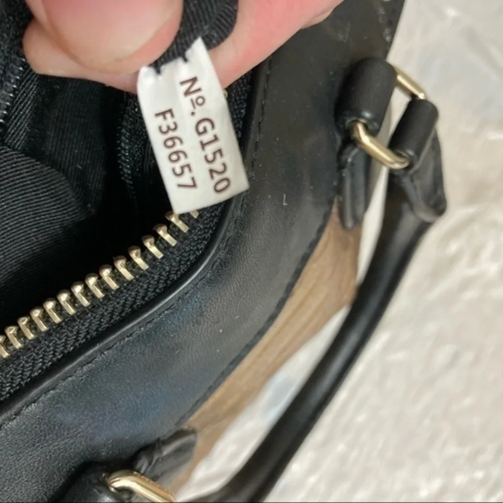 Coach gold embossed leather mini barrel bag